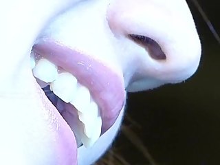 Japanese Woman's Lips & Teeth Up Close 4